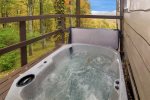 Soak in the hot tub and enjoy the view